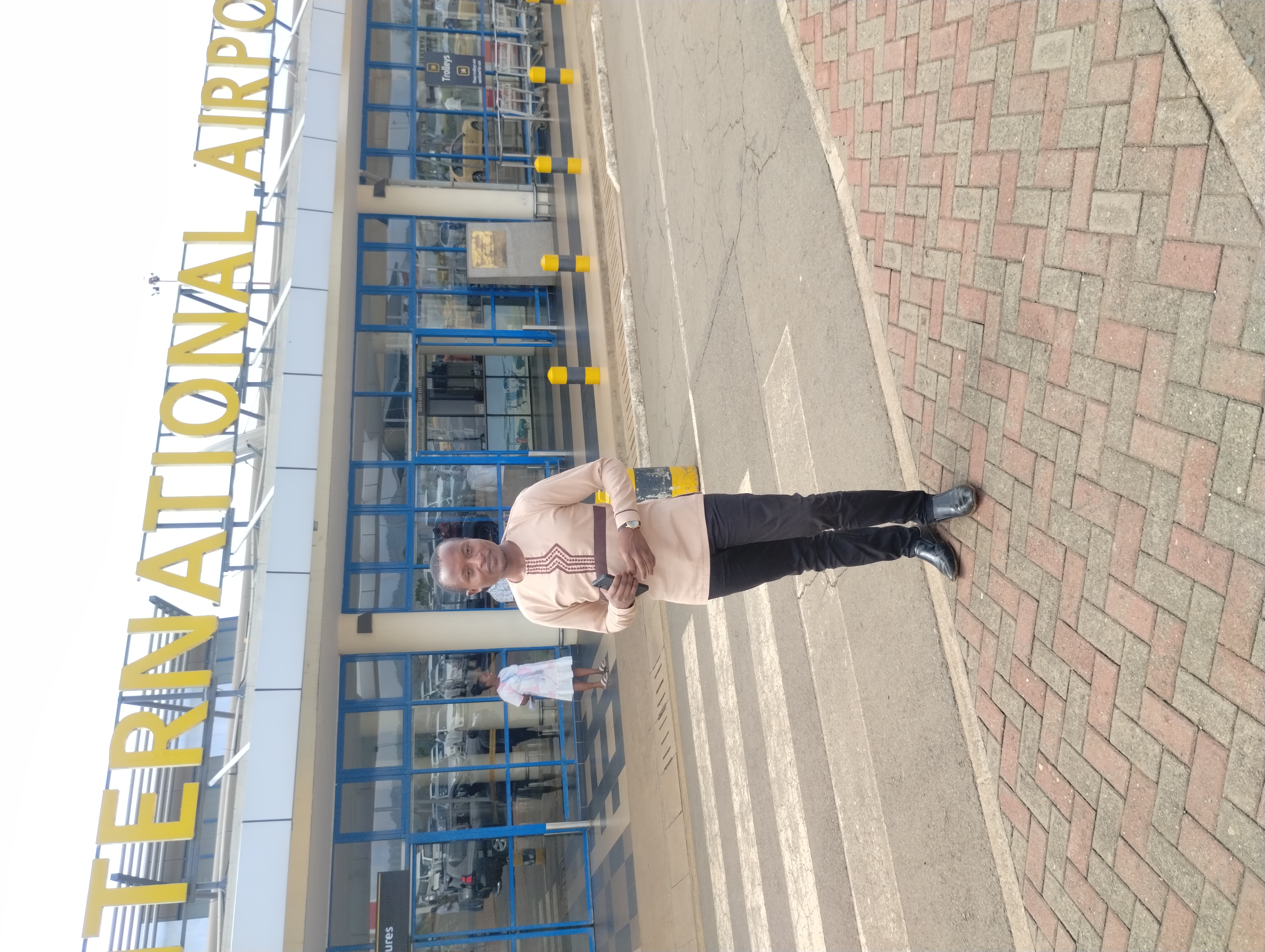Bill Clinton Ooko at international airport